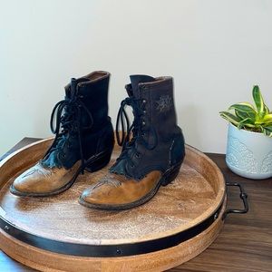 Vintage black and camel leather lace up boots.